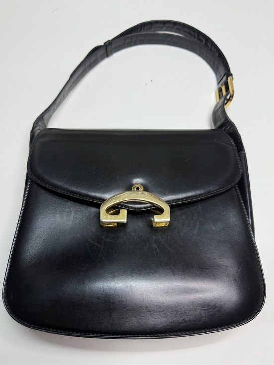 Gucci Handbags - Gucci Black Leather Shoulder Bag with Gold-Tone Buckle